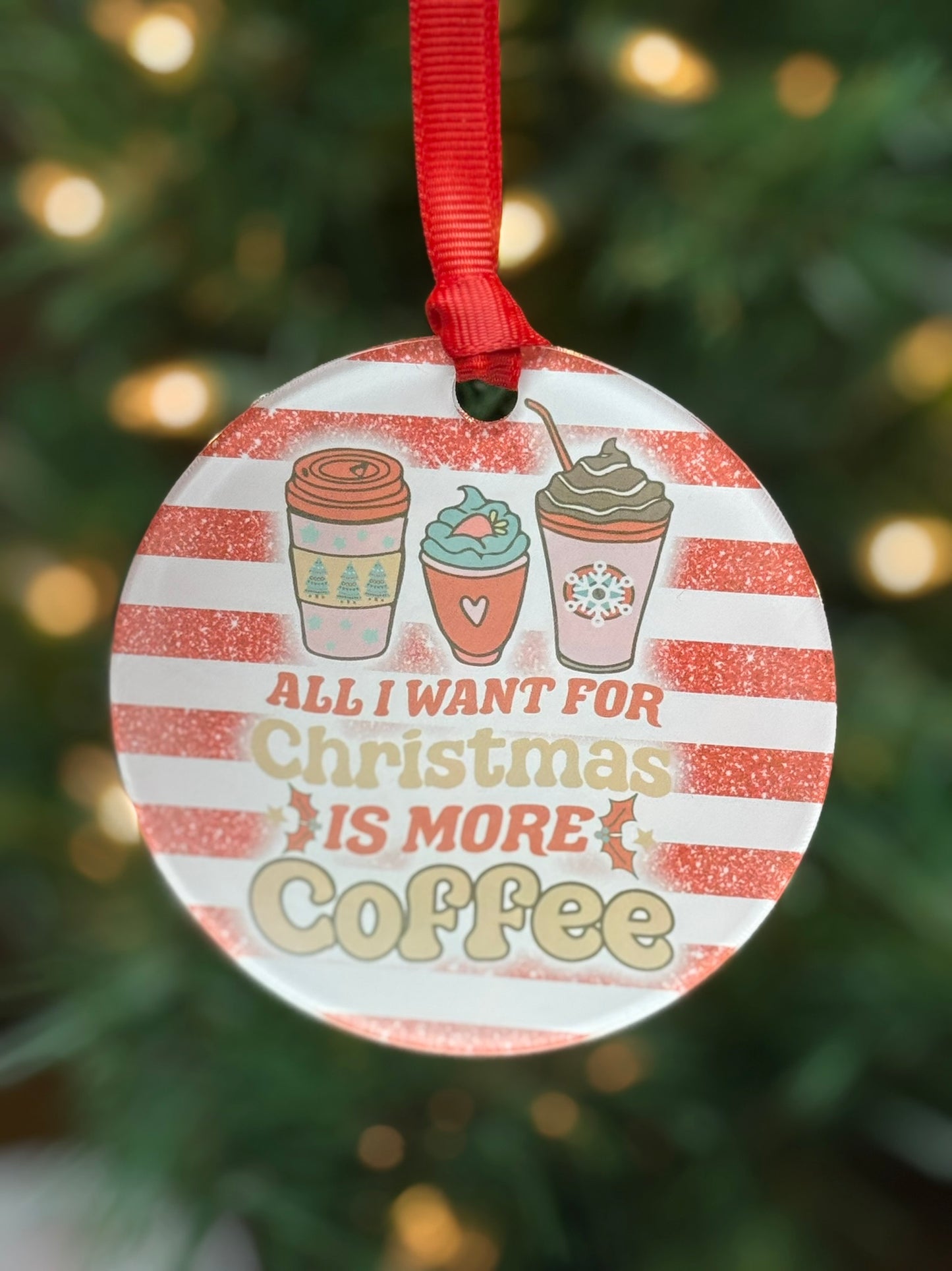 Funny clear acrylic Christmas ornament with coffee quote “All I want for Christmas is More Coffee"; coffee lover gift