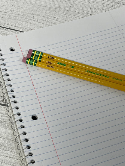 Close up of laser engraved name on personalized #2 pencil showing detail