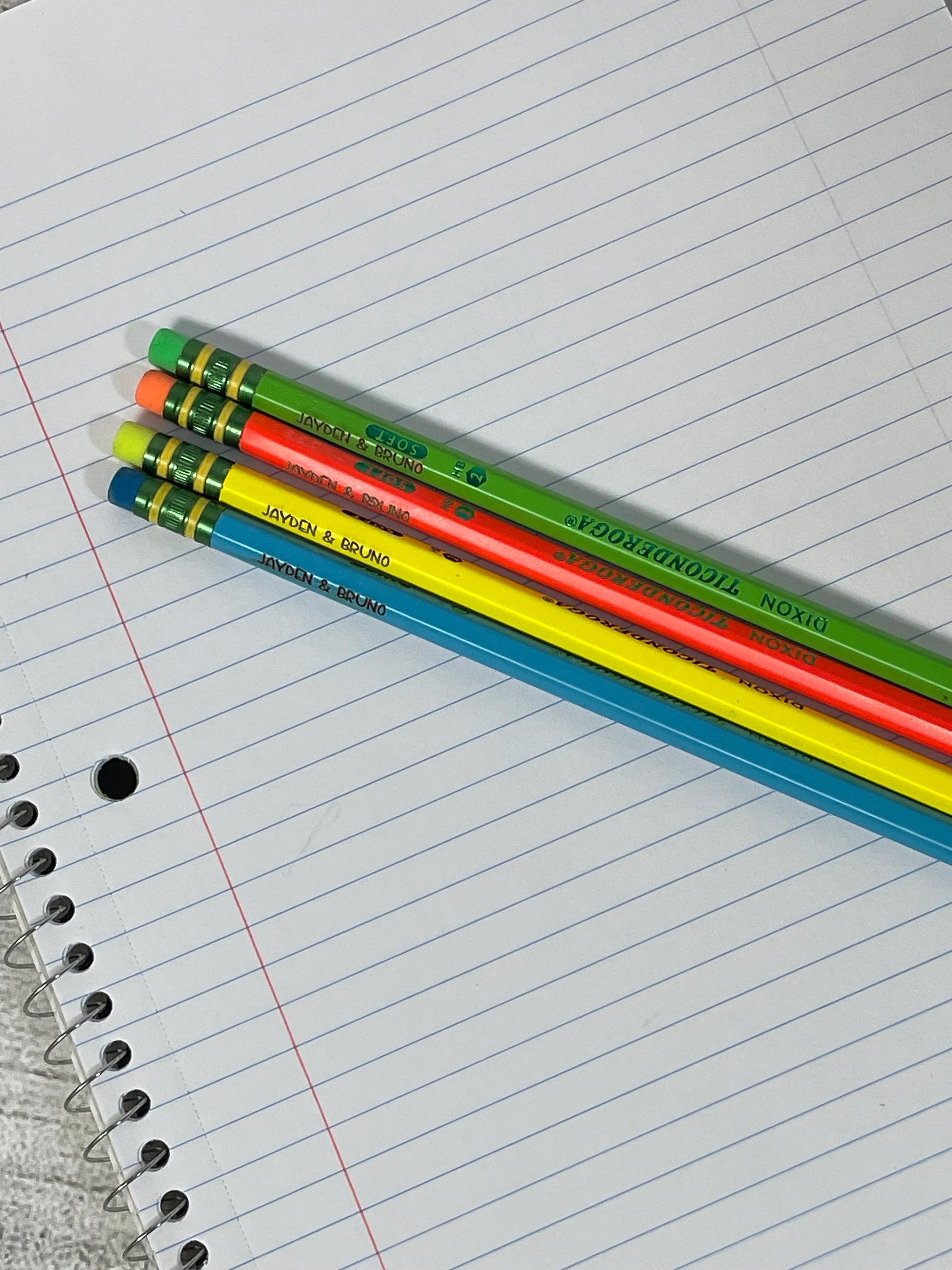 Close up of laser engraved name on personalized #2 pencil showing detai