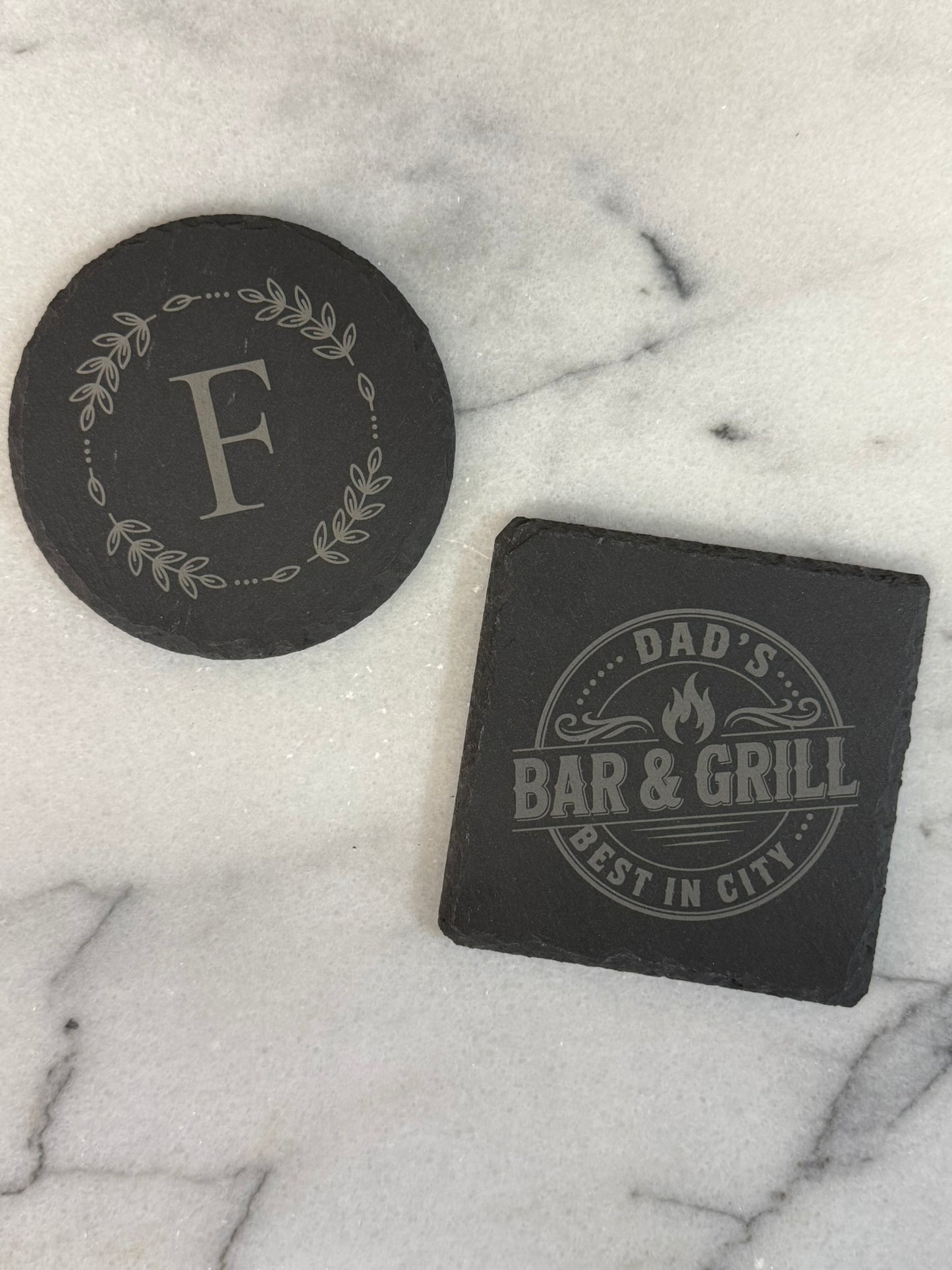 Custom engraved slate coasters with company logo for corporate gifts
