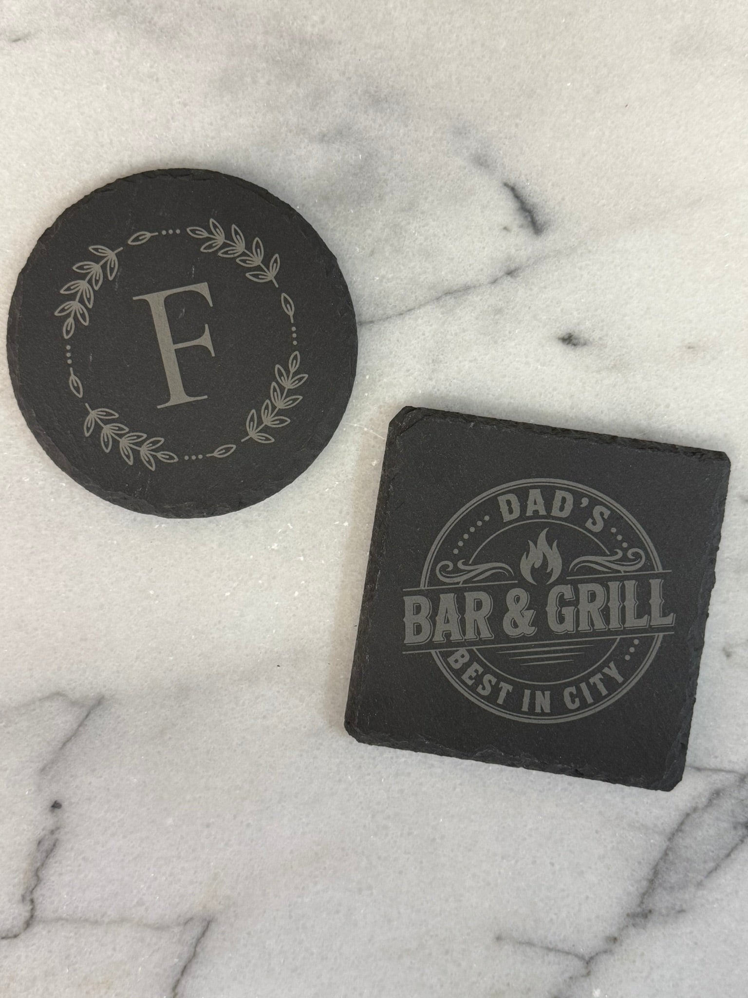 Custom engraved slate coasters with company logo for corporate gifts