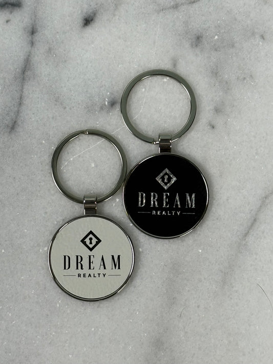 Custom engraved round keychain with personalized business logo and laser engraved design