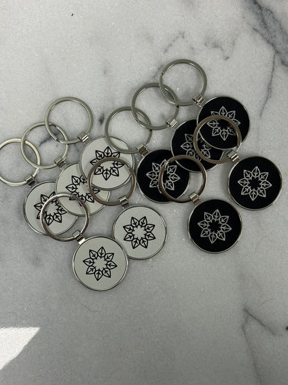 Set of custom engraved round keychains for promotional products, corporate gifts, and events