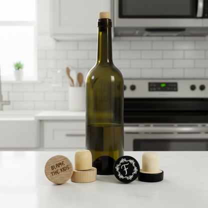 Personalized wood and black wine bottle stoppers side by side