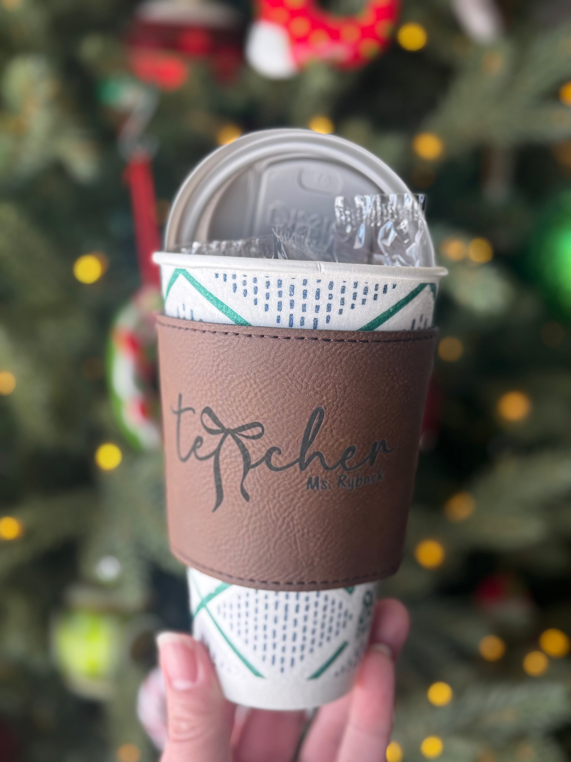 Premium leatherette coffee sleeve for employee appreciation gifts.