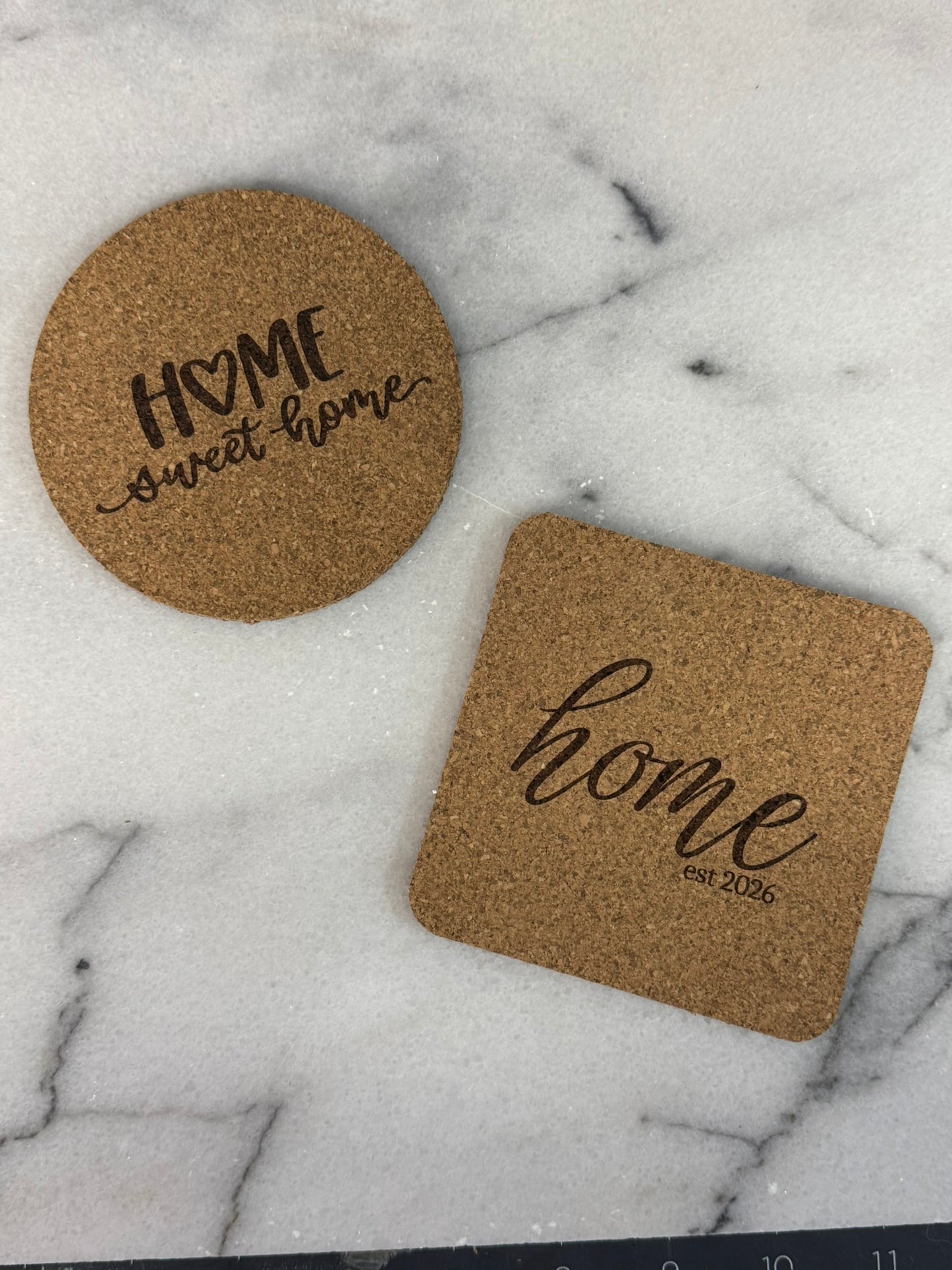 Personalized cork coasters displayed in an office setting
