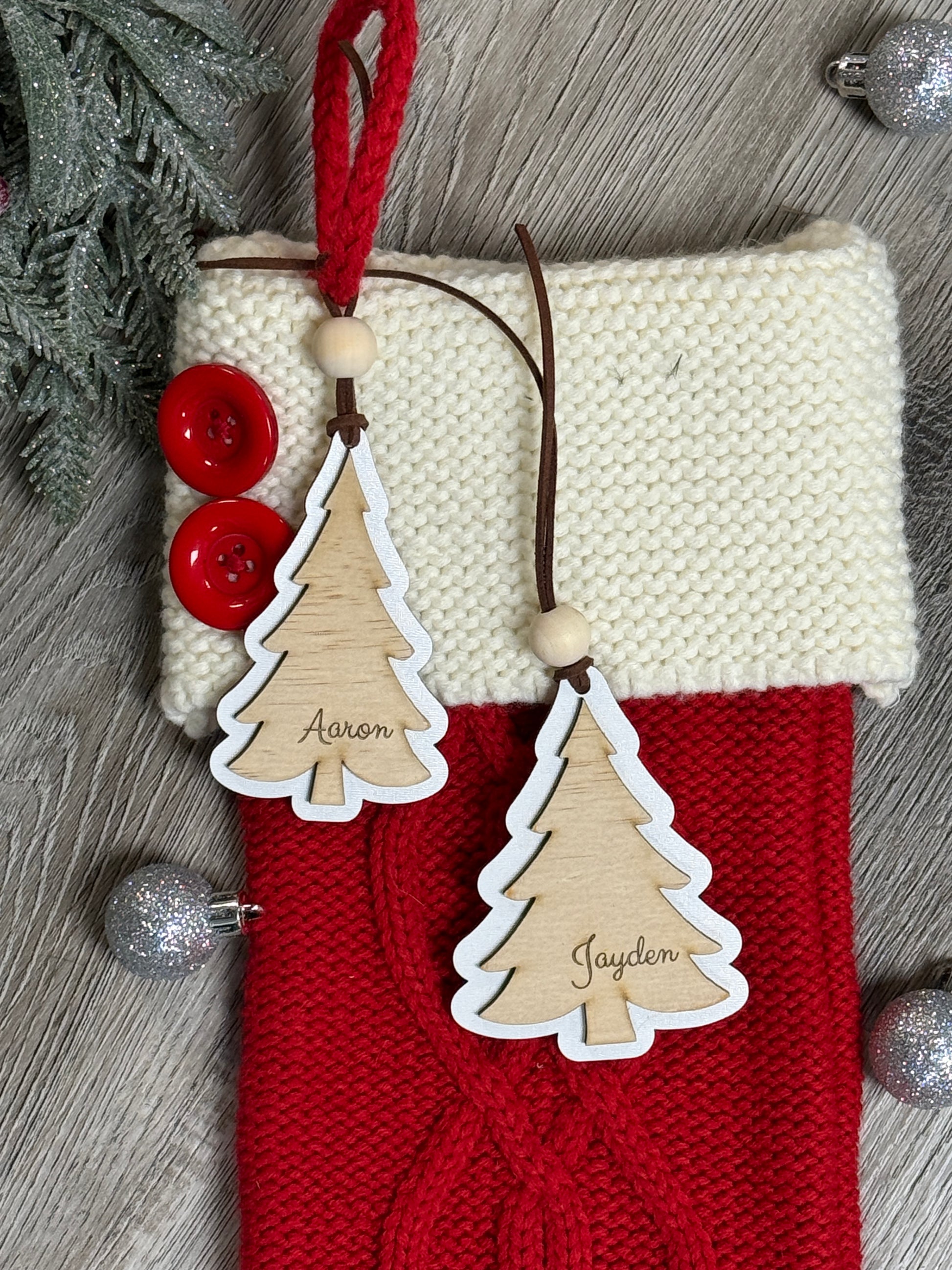 Custom wooden Christmas stocking tags available in two sizes with engraved names