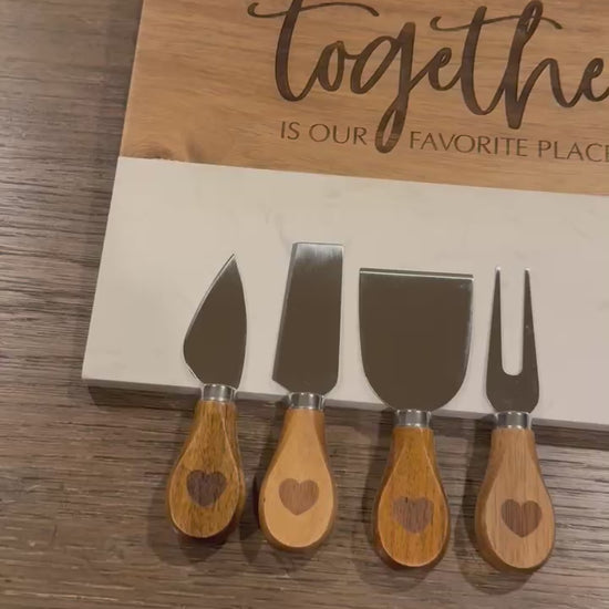 Personalized marble and acacia wood charcuterie board with custom engraving and complete 11 piece accessory set