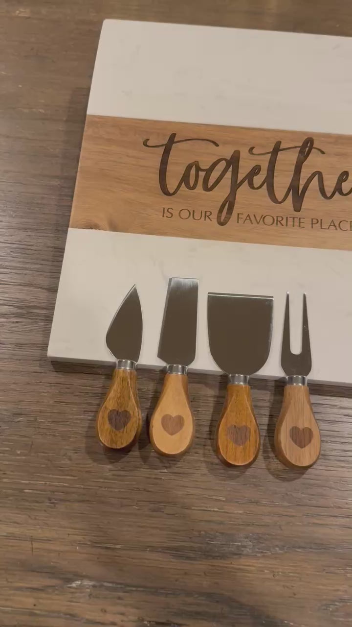 Personalized marble and acacia wood charcuterie board with custom engraving and complete 11 piece accessory set