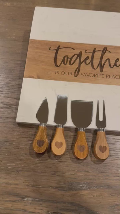 Personalized marble and acacia wood charcuterie board with custom engraving and complete 11 piece accessory set