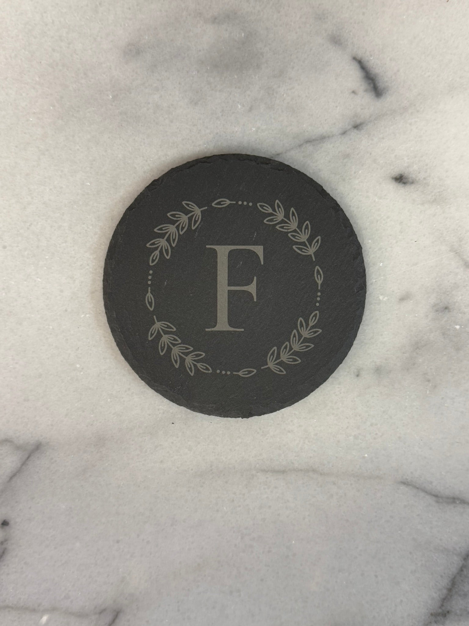 Round and square hand-chiseled slate coasters with custom engraving